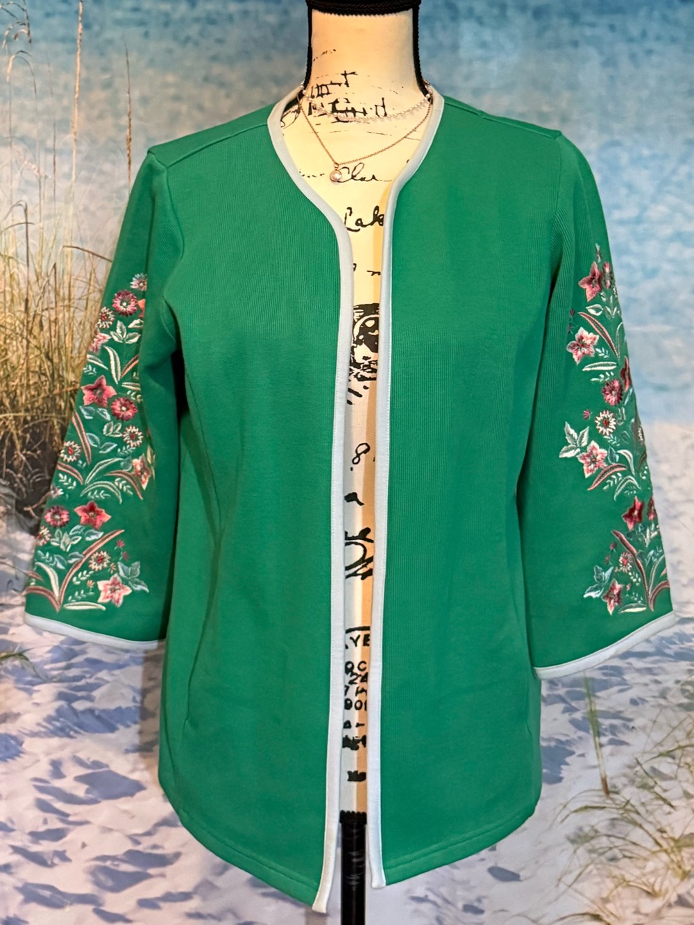 Bob Mackie Black and Gold Label on Green Garment with pockets